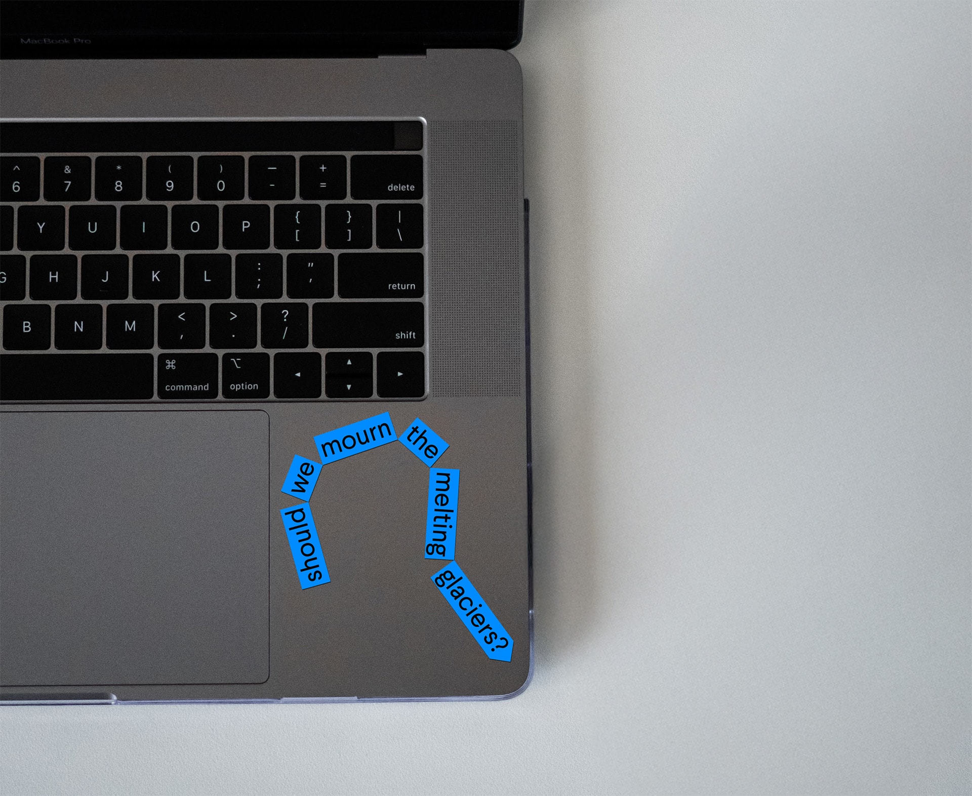 Laptop with a PD Arts + Creative sticker on it