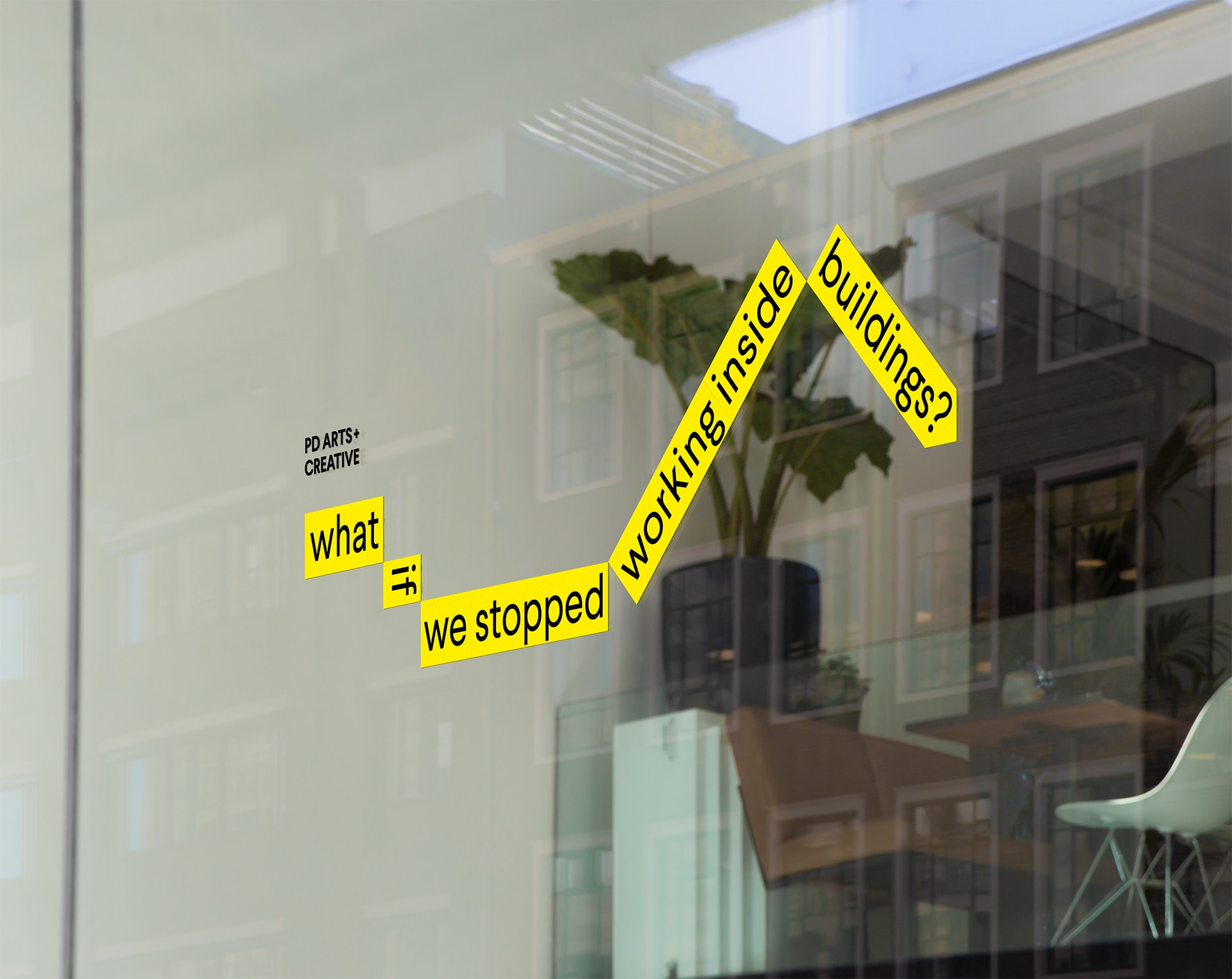 PD Arts + Creative sticker on window